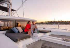 Acacia Agave catamaran onboard guests on deck relaxing