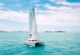 Acacia catamaran under full sail sailing in Croatia