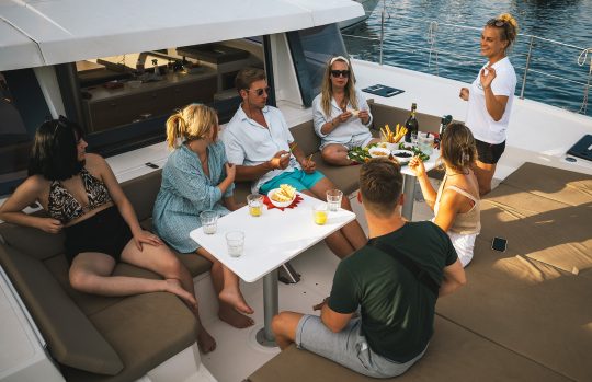 Agave Catamaran guests eating