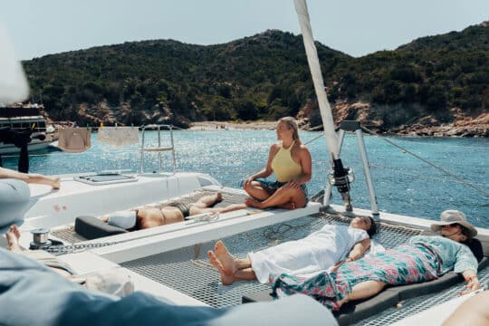 Agave catamaran guests on board wellness yoga