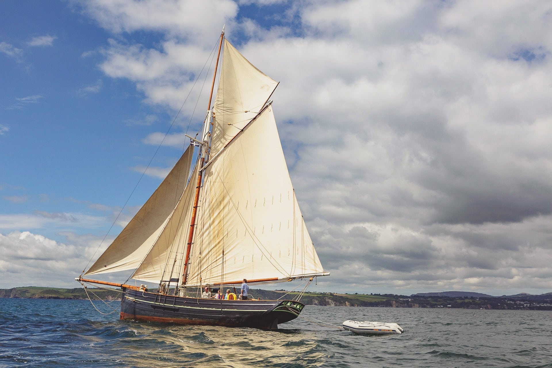 Agnes charter boat full sail in Cornwall