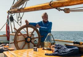 Bessie Ellen guest solo sailor at helm of tall ship