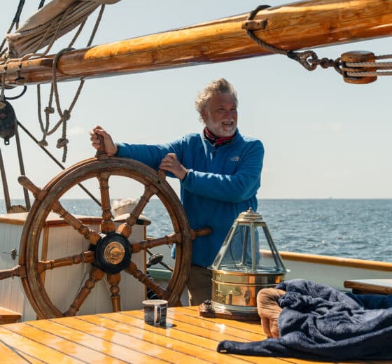 Bessie Ellen guest solo sailor at helm of tall ship