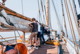 Bessie Ellen guests furling mainsail