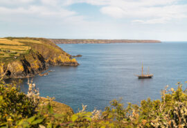 Bessie Ellen tall ship anchored off Cornish coast, Cadgwith, Cornwall