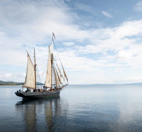 Bessie Ellen under way from the side, Hebrides, Scotland