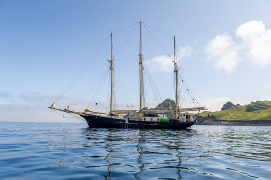 Blue Clipper anchored in the Hebrides, Scotland