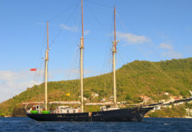 Blue Clipper close up anchored off Caribbean island