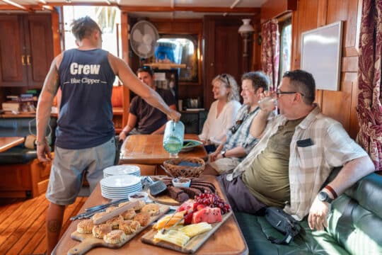 Blue Clipper guests and crew onboard food dining saloon