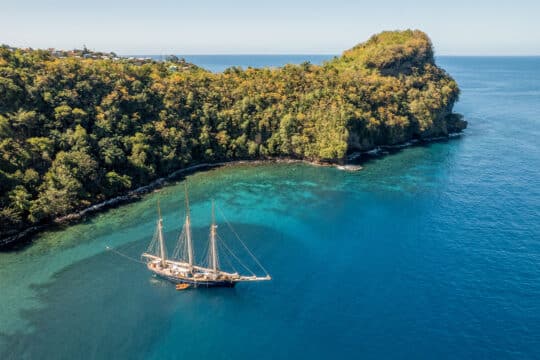 Blue Clipper tall ship anchored off the coast of Wallilabou, St Vincent, Caribbean