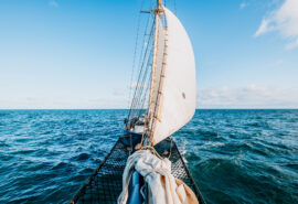 Blue Clipper view from bowsprit of tall ship
