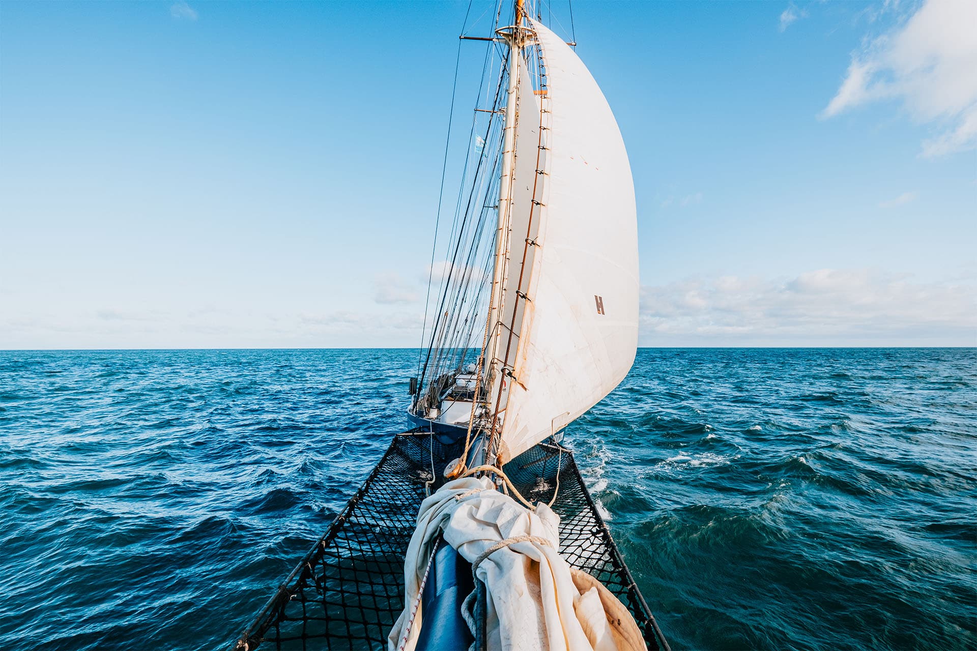 Blue Clipper view from bowsprit of tall ship