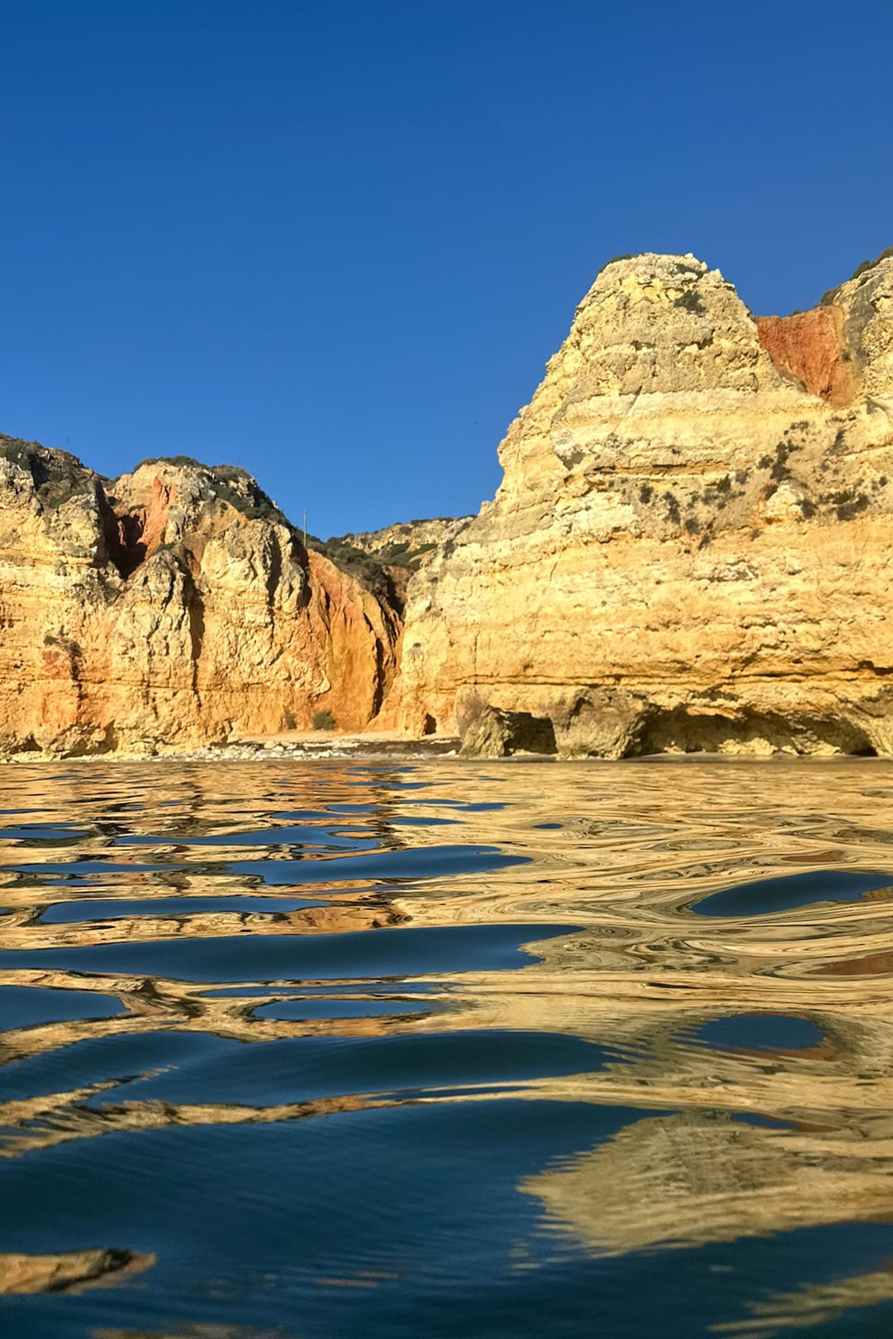 Blue Clipper, view of coast from the water, Algarve, Portugal