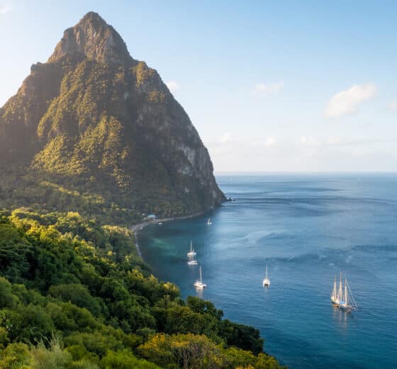 Caribbean morning sunlight at Petit Piton, St Lucia, Blue Clipper anchored