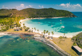 Caribbean view of boats anchored in bay in the Grenadines