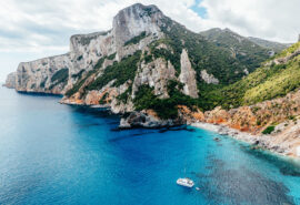 Catamaran anchored at Cala Goloritze, Sardinina, Italy