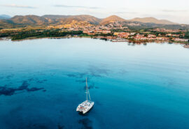 Catamaran anchored at Porto San Paolo, Sardinia Coast, Italy