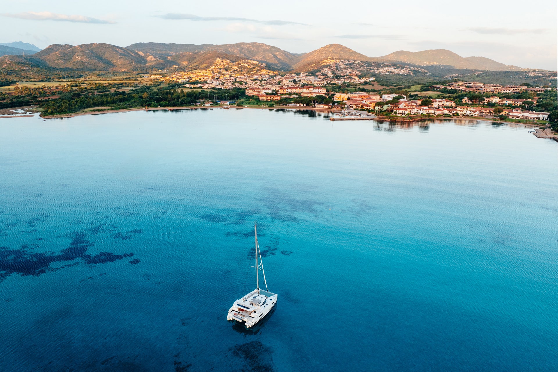 Catamaran anchored at Porto San Paolo, Sardinia Coast, Italy