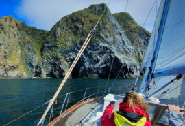 Cherokee guests female sailors on board with view of Norwegian fjords