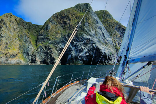 Cherokee guests female sailors on board with view of Norwegian fjords