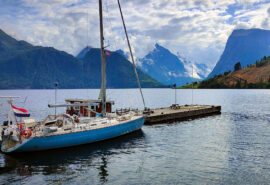 Cherokee in Norwegian Fjords with mountains behind