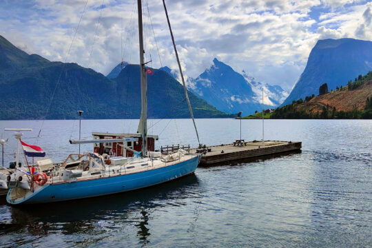 Cherokee in Norwegian Fjords with mountains behind