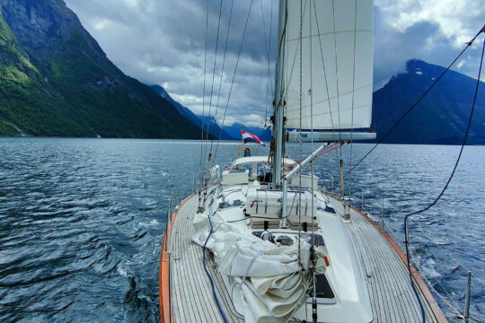 Cherokee on deck under sail in Norway Norwegian Fjords