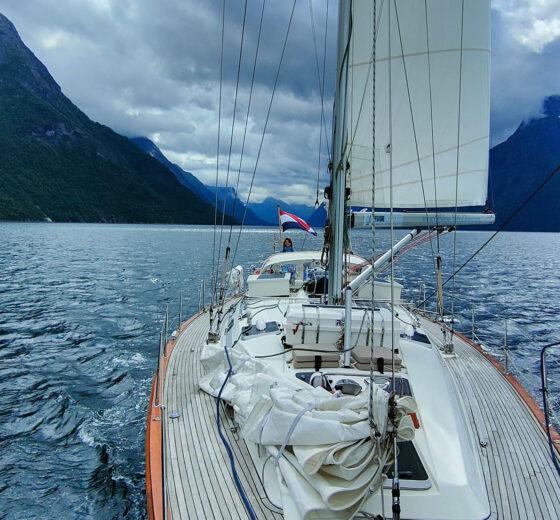 Cherokee on deck under sail in Norway Norwegian Fjords