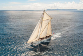 Chronos yacht in full sail sunshine sailing SC