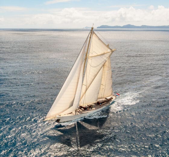 Chronos yacht in full sail sunshine sailing SC
