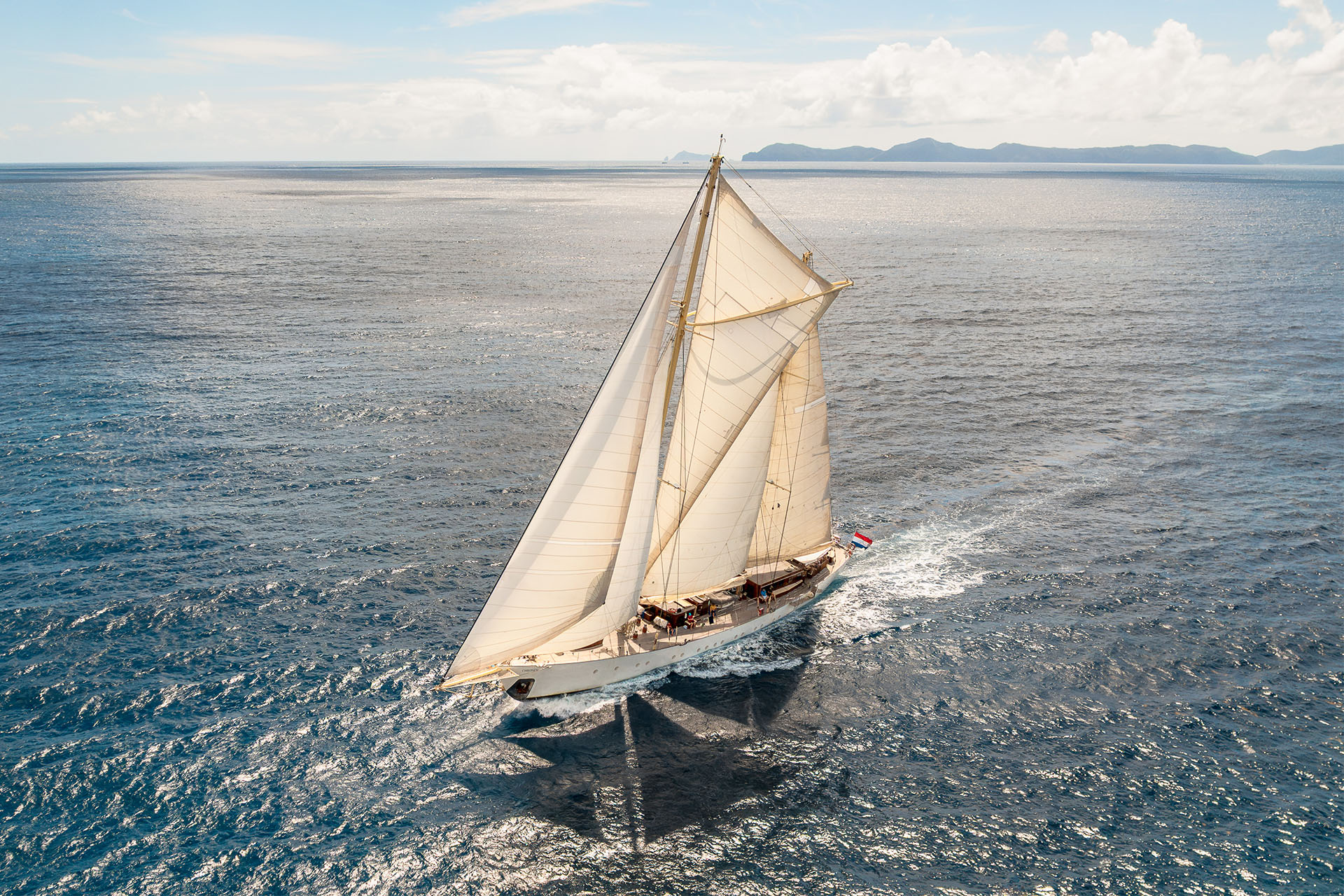 Chronos yacht in full sail sunshine sailing SC