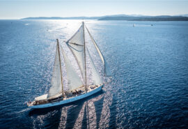Chronos yacht sailing in sunshine