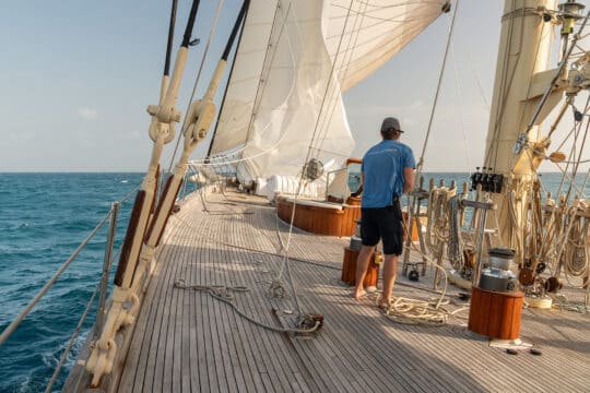 Chronos yacht underway on deck sunshine sailing crew
