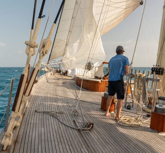 Chronos yacht underway on deck sunshine sailing crew