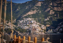 Chronos yacht view on deck of Amalfi coast, Italy