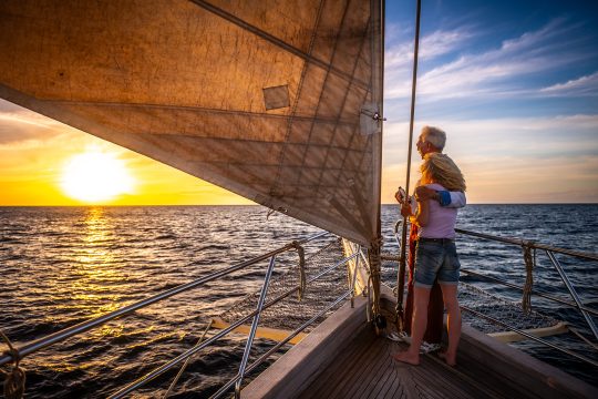 Couple on board SC yacht watching the sunset Chronos Rhea