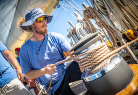 Crew member on board Chronos Rhea