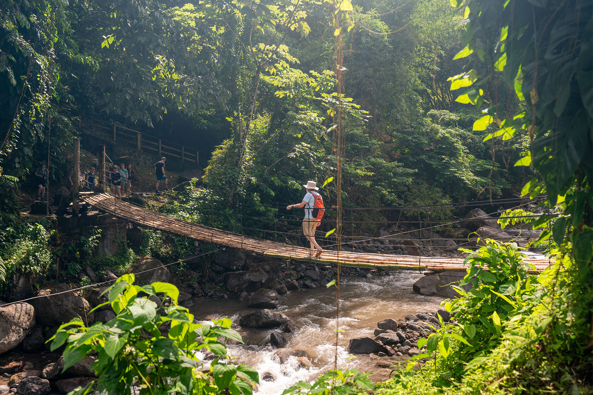 Crossing the bridge to Dark View Falls, St Vincent, Caribbean waterfall