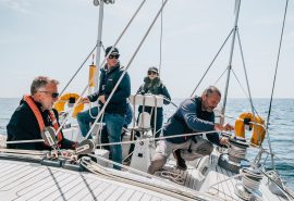 Emma Claire guests and skipper sunshine sailing on deck