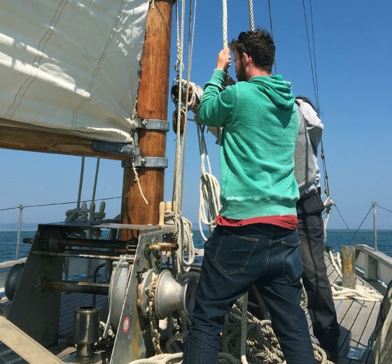 Escape guest hoisting sail