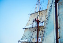 Florette crew up the mast