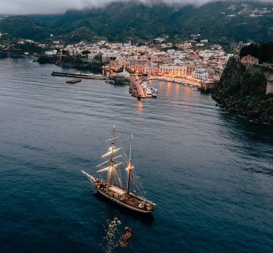 Florette anchored in Lipari at night, Aeolian Islands