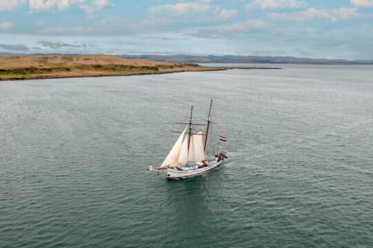 Flying Dutchman Aerial from above sailin towards Oban, Hebrides, Scotland