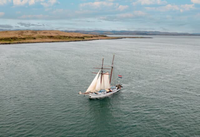 Flying Dutchman Aerial from above sailin towards Oban, Hebrides, Scotland