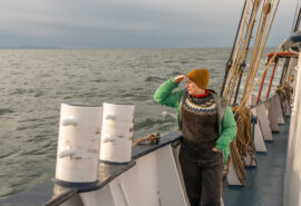 Flying Dutchman guest onboard watching the sunrise