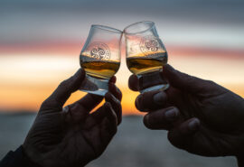 Flying Dutchman guests toasting Scottish whisky Hebrides, Scotland