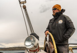Flying Dutchman skipper Aries at the helm