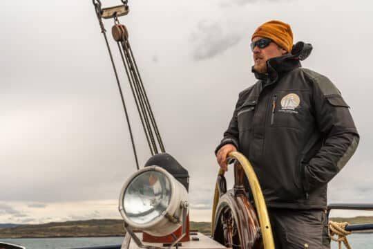 Flying Dutchman skipper Aries at the helm