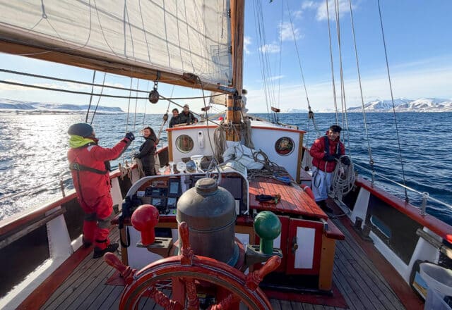 Goxsheim on deck traditional boat sailing in svalbard Arctic circle norway