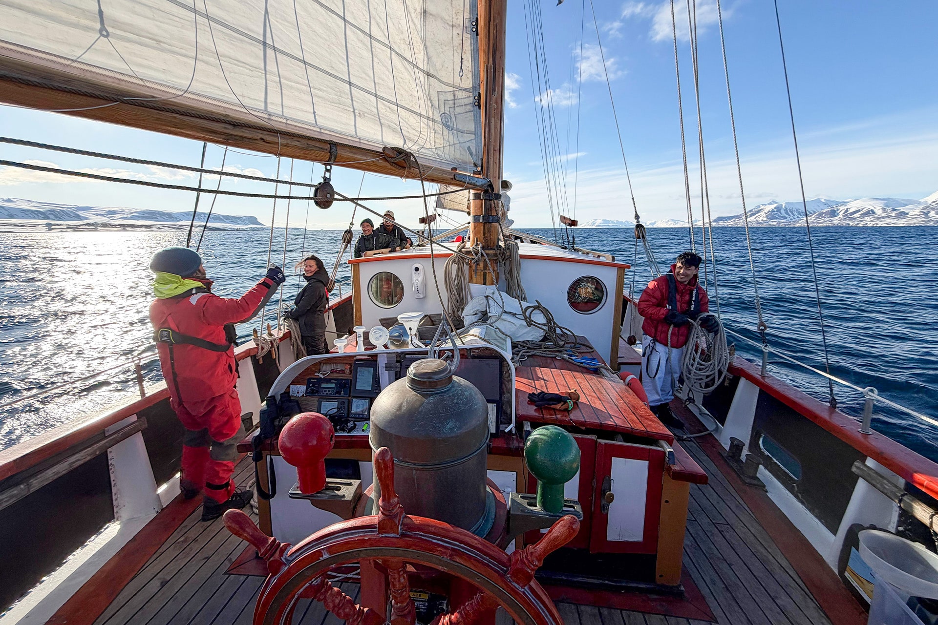 Goxsheim on deck traditional boat sailing in svalbard Arctic circle norway
